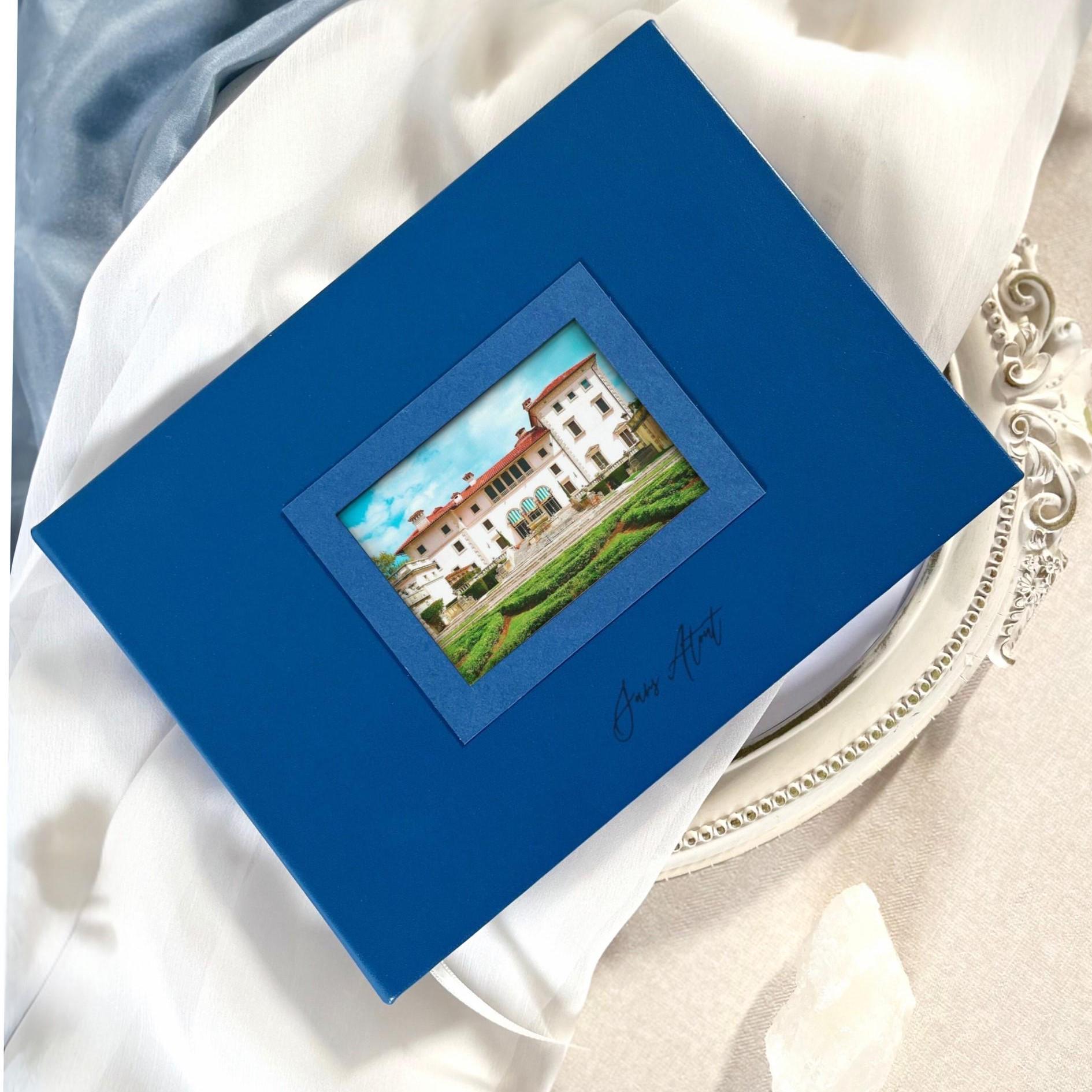 Elegant custom wedding guest book in royal blue vegan leather, featuring laser-engraved names and dates, ideal as a wedding gift or keepsake.