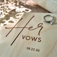 Close-up view of Her Vows book engraved with date on a light wood hardcover – perfect for rustic weddings.