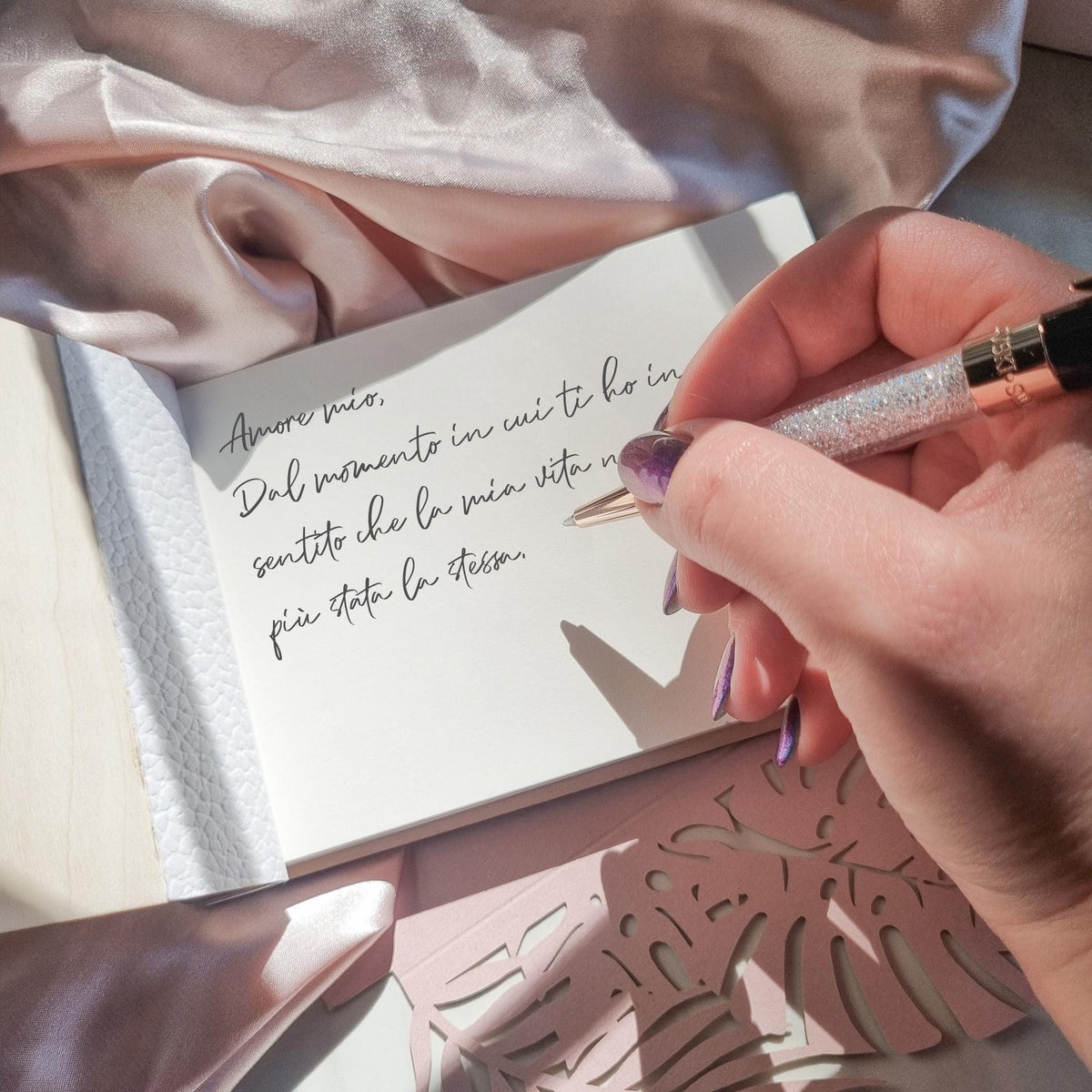 Open view of the Her Vows wooden vow book, showing cream-colored pages with handwritten vows - great for weddings or vow renewals.
