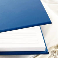 Royal blue vegan leather guest book with lined white pages. Perfect for weddings, retirements, or bridal showers. A durable and elegant keepsake for collecting heartfelt wishes, personal notes, and memories from guests.