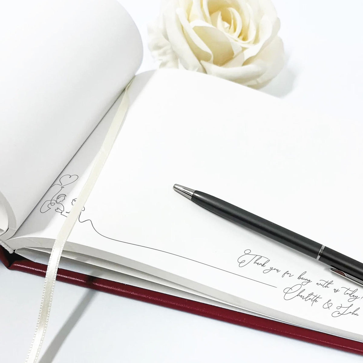 Custom made leather wedding guest book with watercolor illustration of the venue and personalized text pages