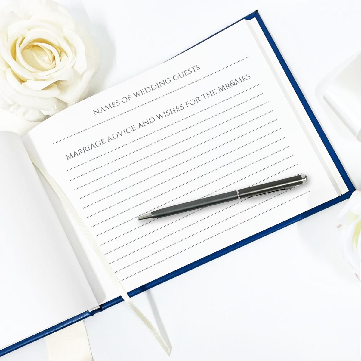 Custom-made leather wedding guest book with watercolor illustration of the venue and lined pages