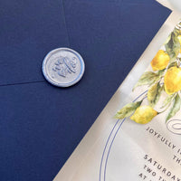 Blue wax seal reading “WE DO.”