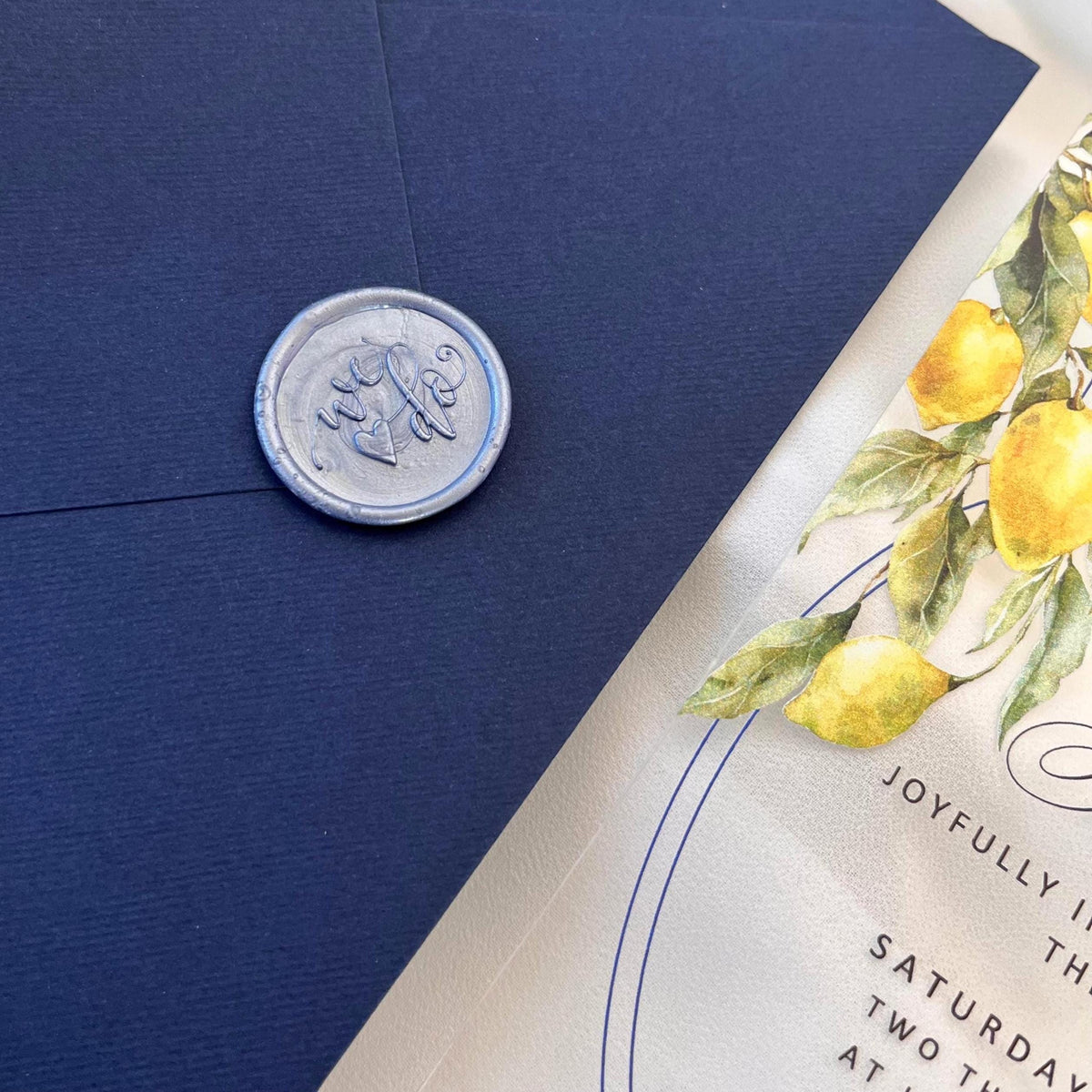 Blue wax seal reading “WE DO.”