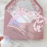 Acrylic wedding card with Japanese cherry blossom design, blush envelope liner, and decorative wax seal.