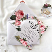 Modern plexiglass wedding invitation with rose design, crisp white envelope, and rose-printed liner for a romantic look.