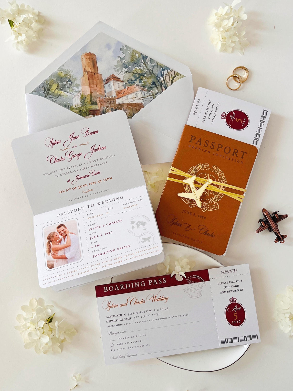 This wedding stationery suite features a caramel vegan leather passport invitation with a coordinating boarding pass RSVP card.